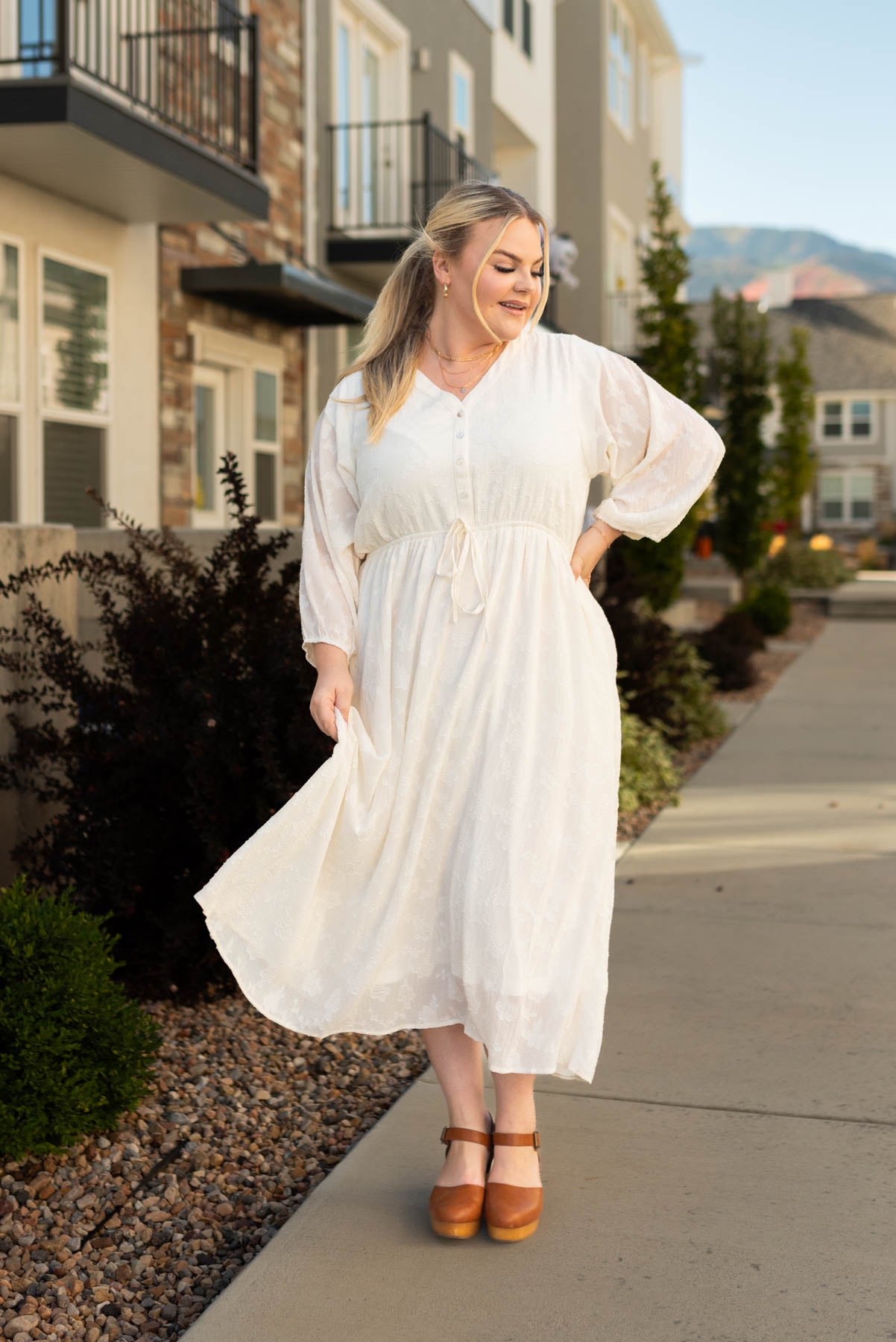 Plus size Sana Cream dress with long sleeve and button up bodice
