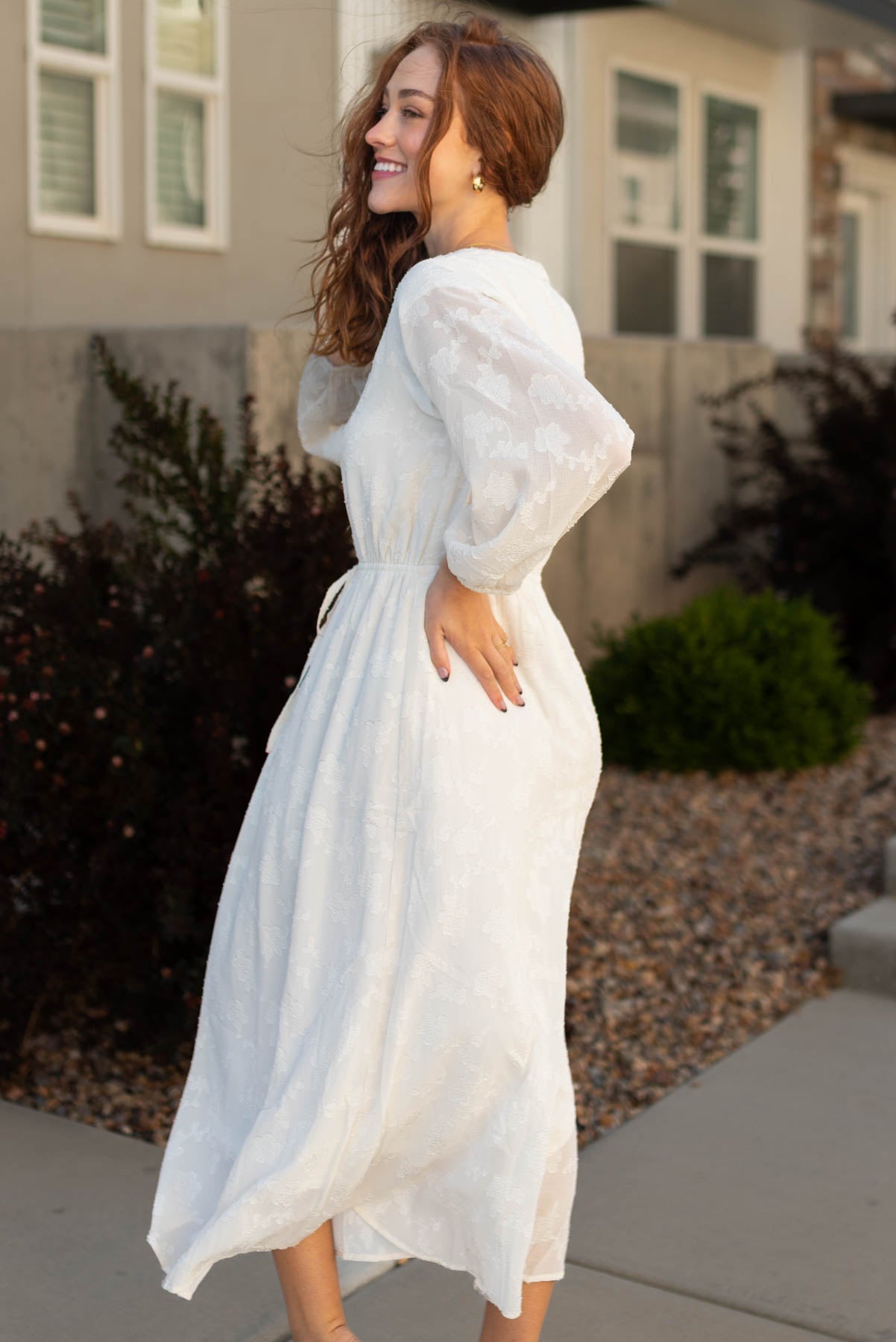 Side view of a cream dress