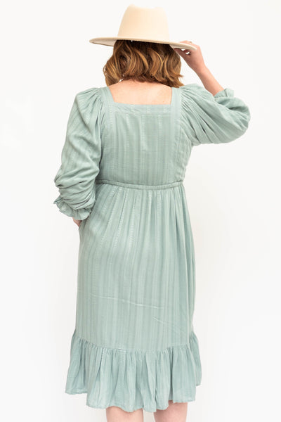 Back view of a seafoam green dress