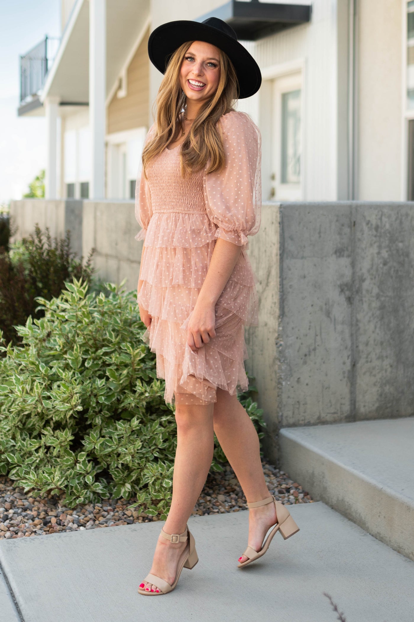 Ruffle tulle skirt of a nude dress