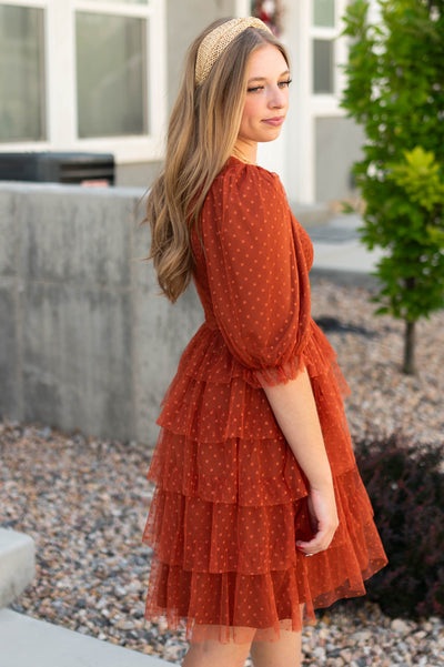 Side view of a rust dress