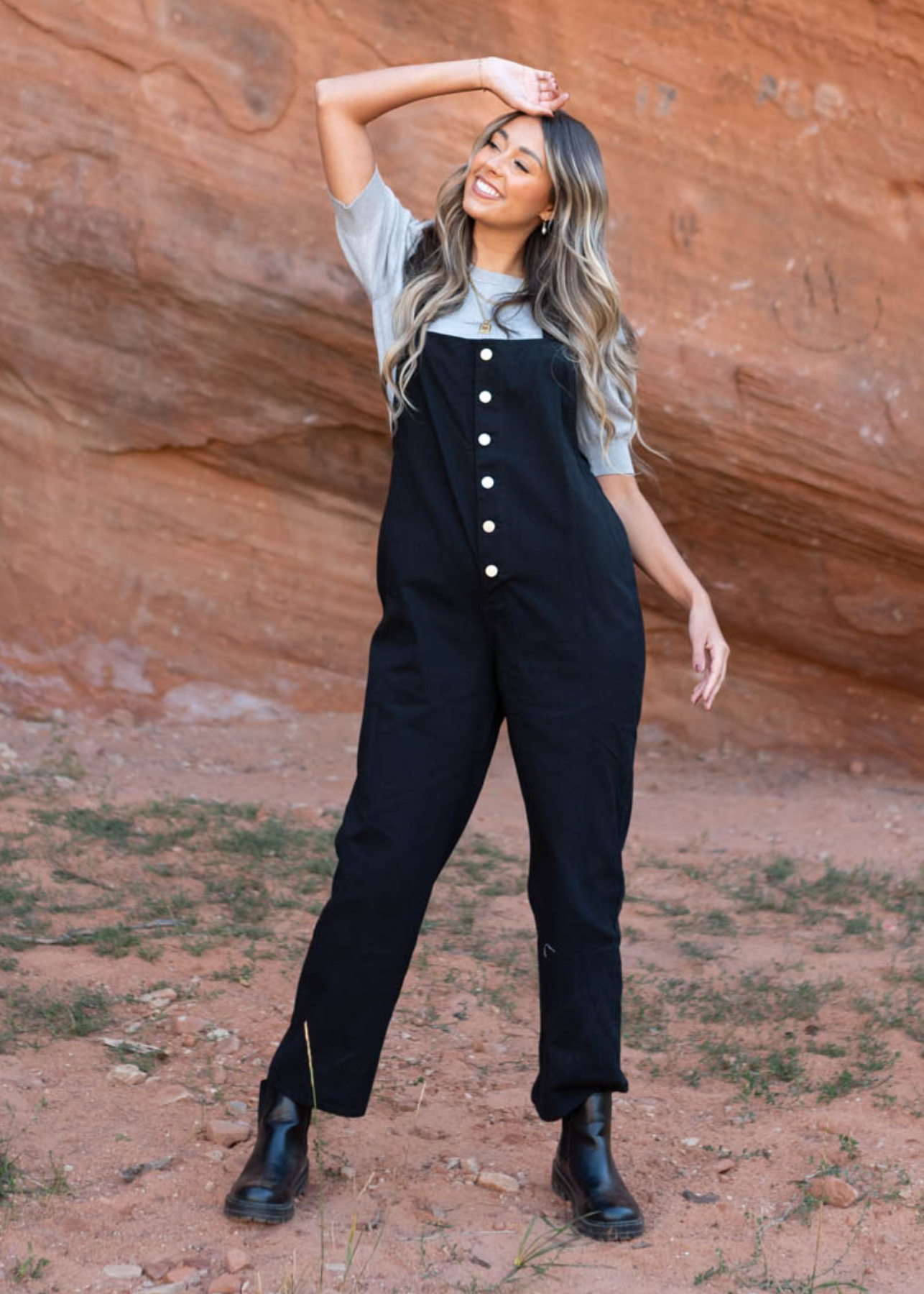 Black jumpsuit with white buttons