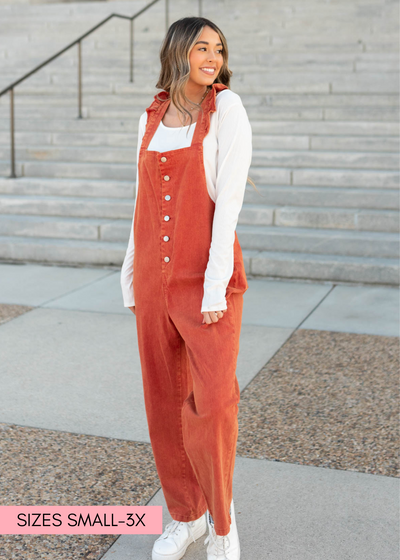 Rust jumpsuit with ruffle straps