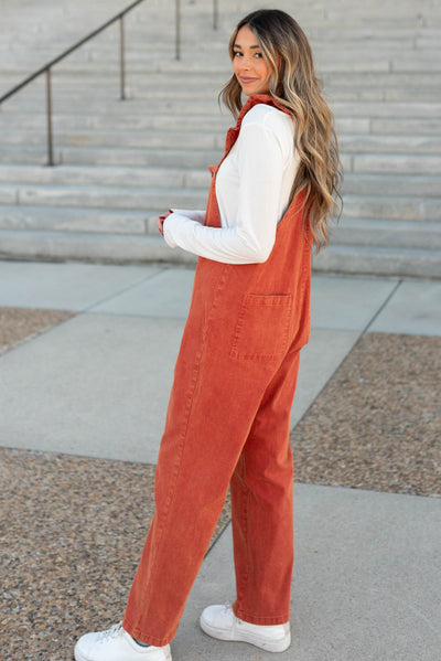 Side view of the rust jumpsuit