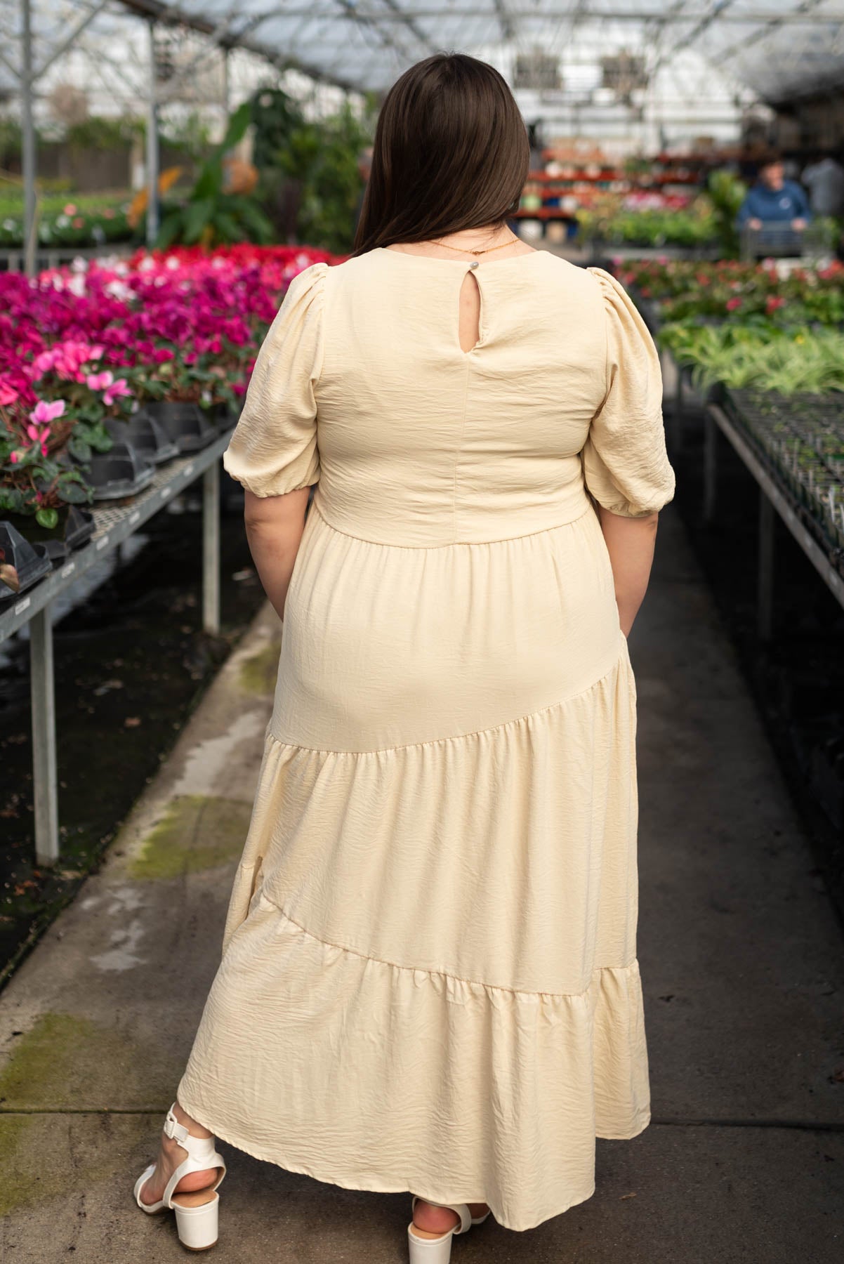 Back view of the plus size taupe tiered dress