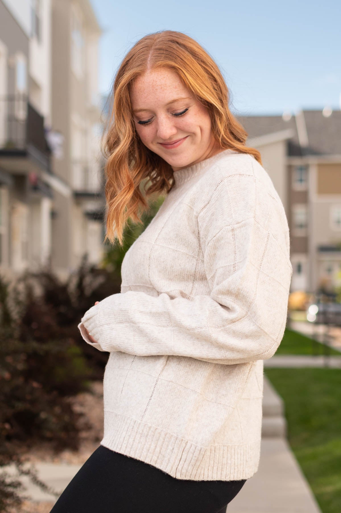 Side of a oatmeal sweater