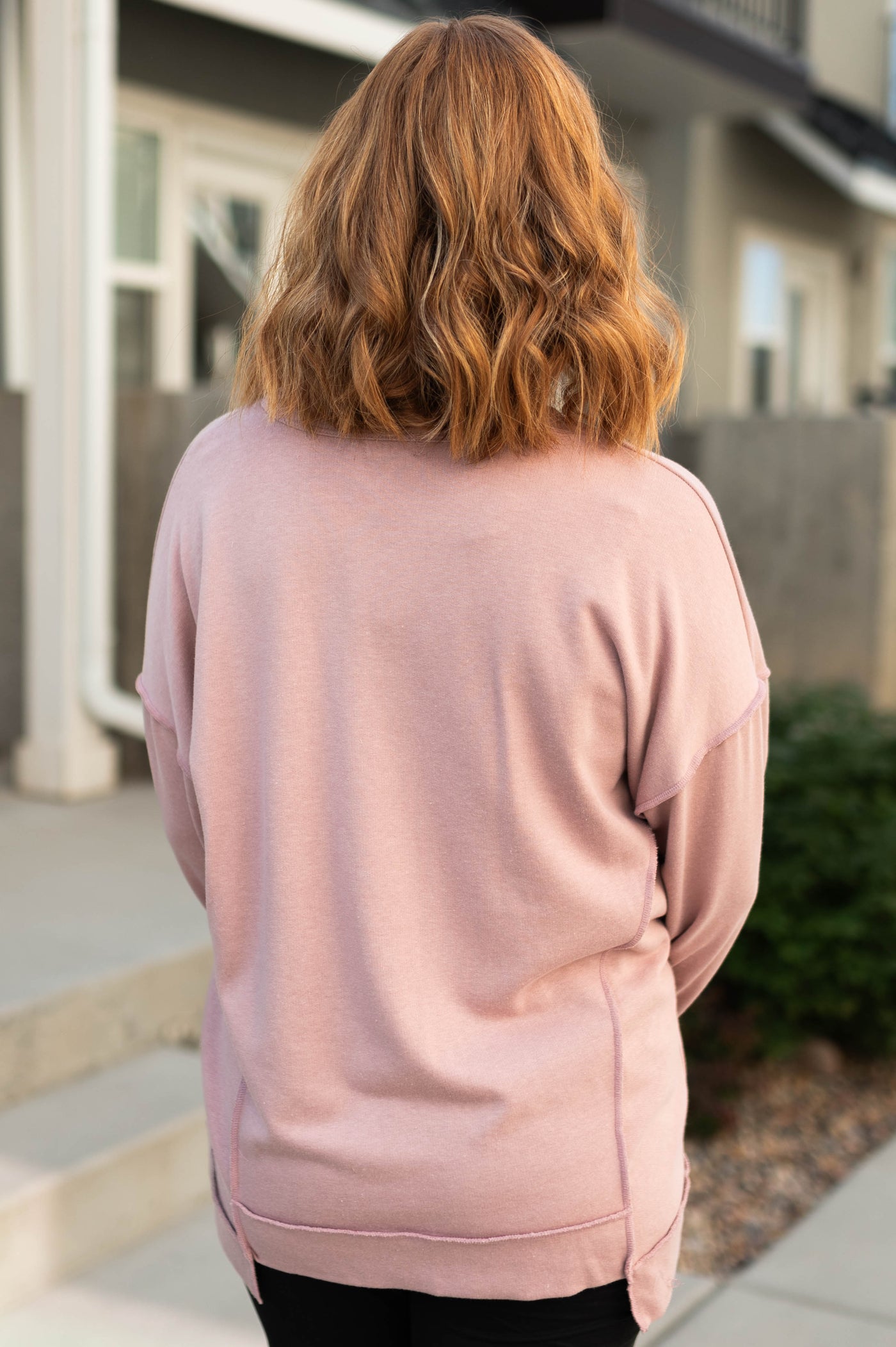 Back view of Shania wood rose pullover