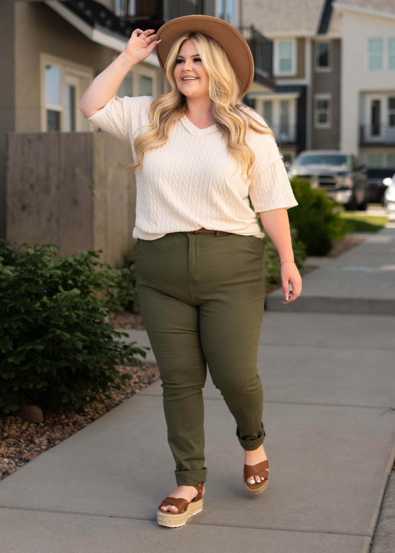 Plus size cream top with plus size olive pants that are sold separately