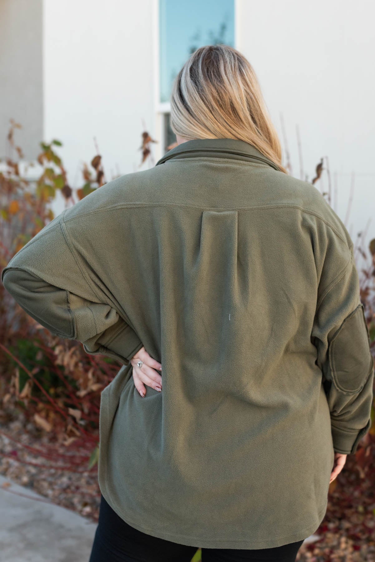 Back view of the plus size army green shacket
