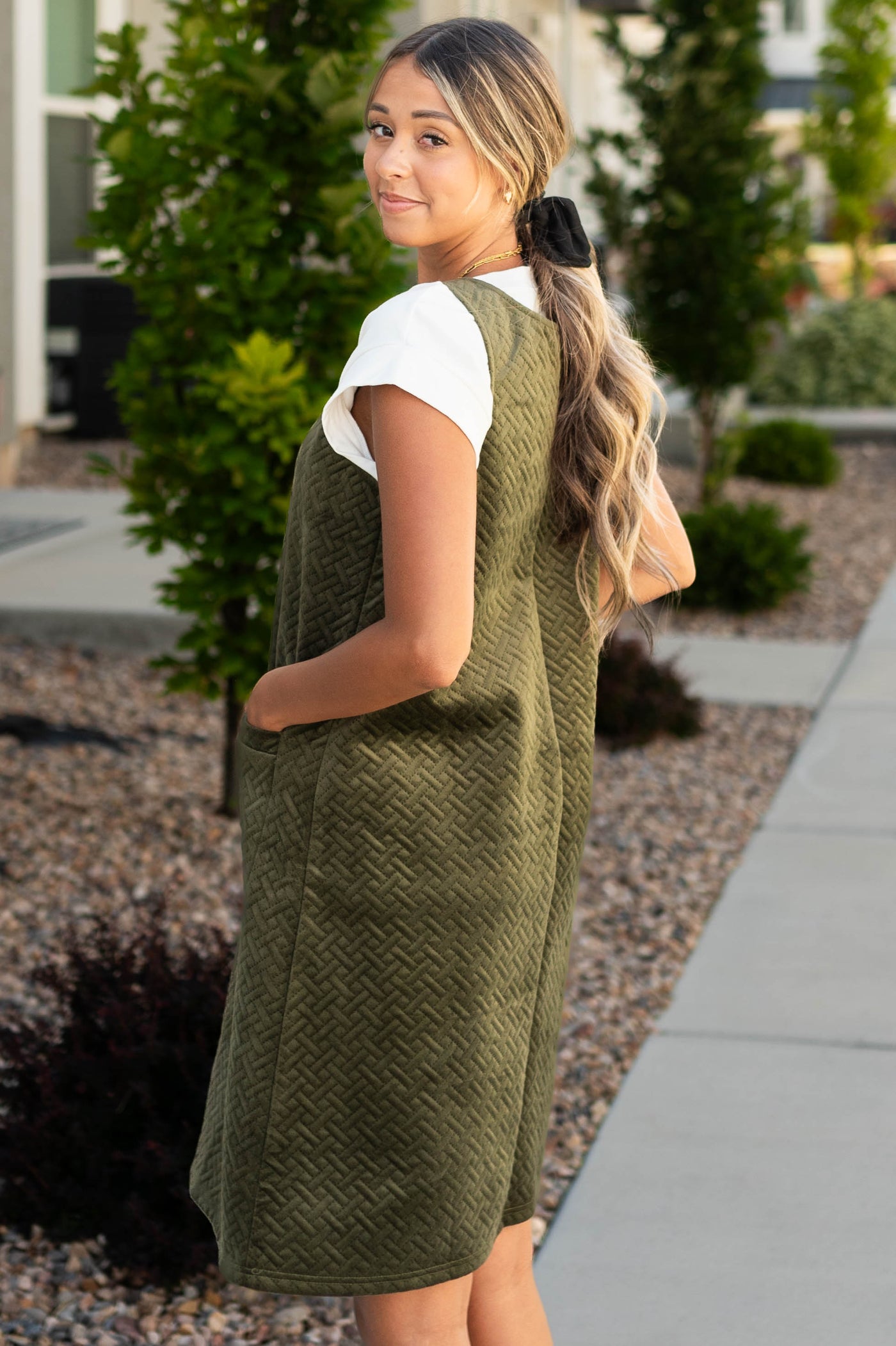 Side view of a olive dress