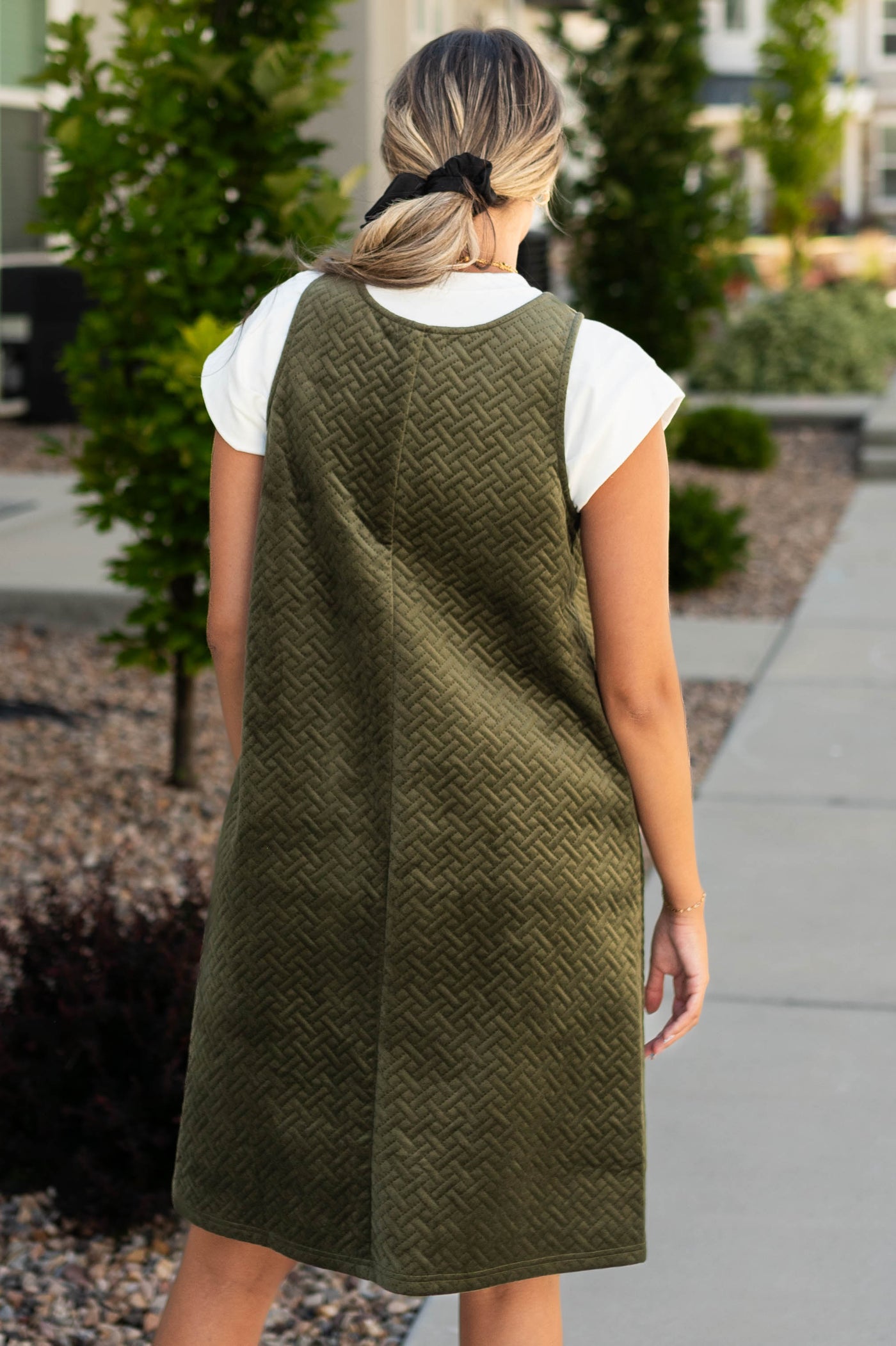 Back view of a olive dress