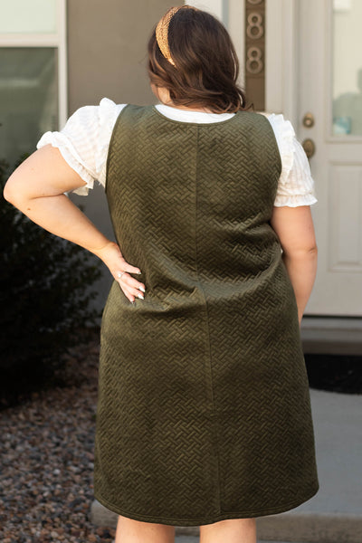 Back view of a plus size olive dress