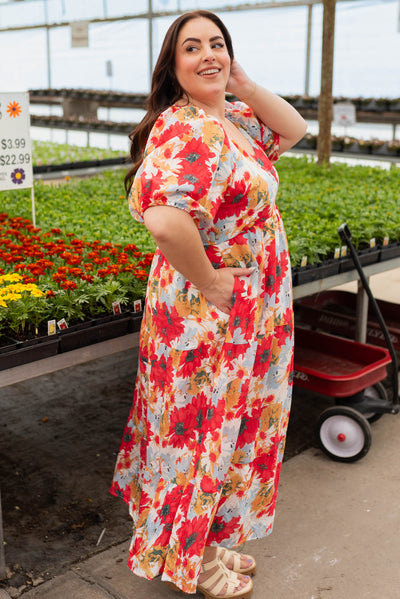 Side view of the red floral dress in plus size