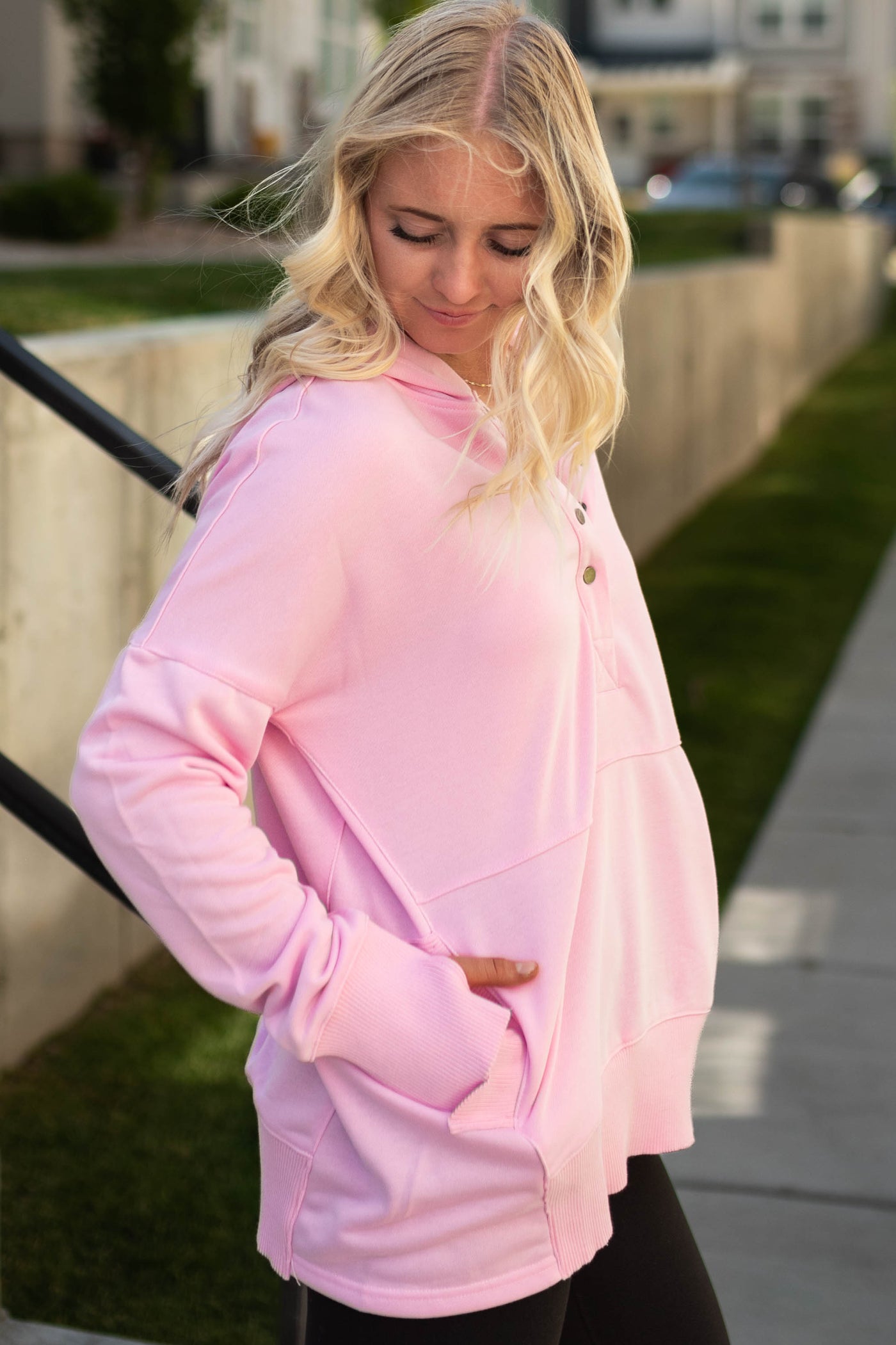 Side view of a pink hoodie
