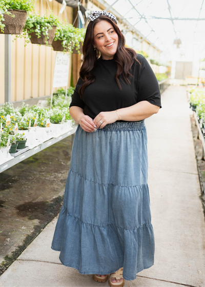 Plus size denim blue tiered skirt and black textured top sold separately 