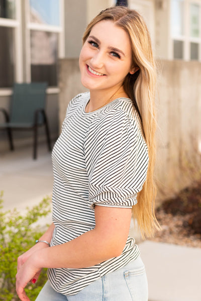 Side view of the stripe bubble sleeve top