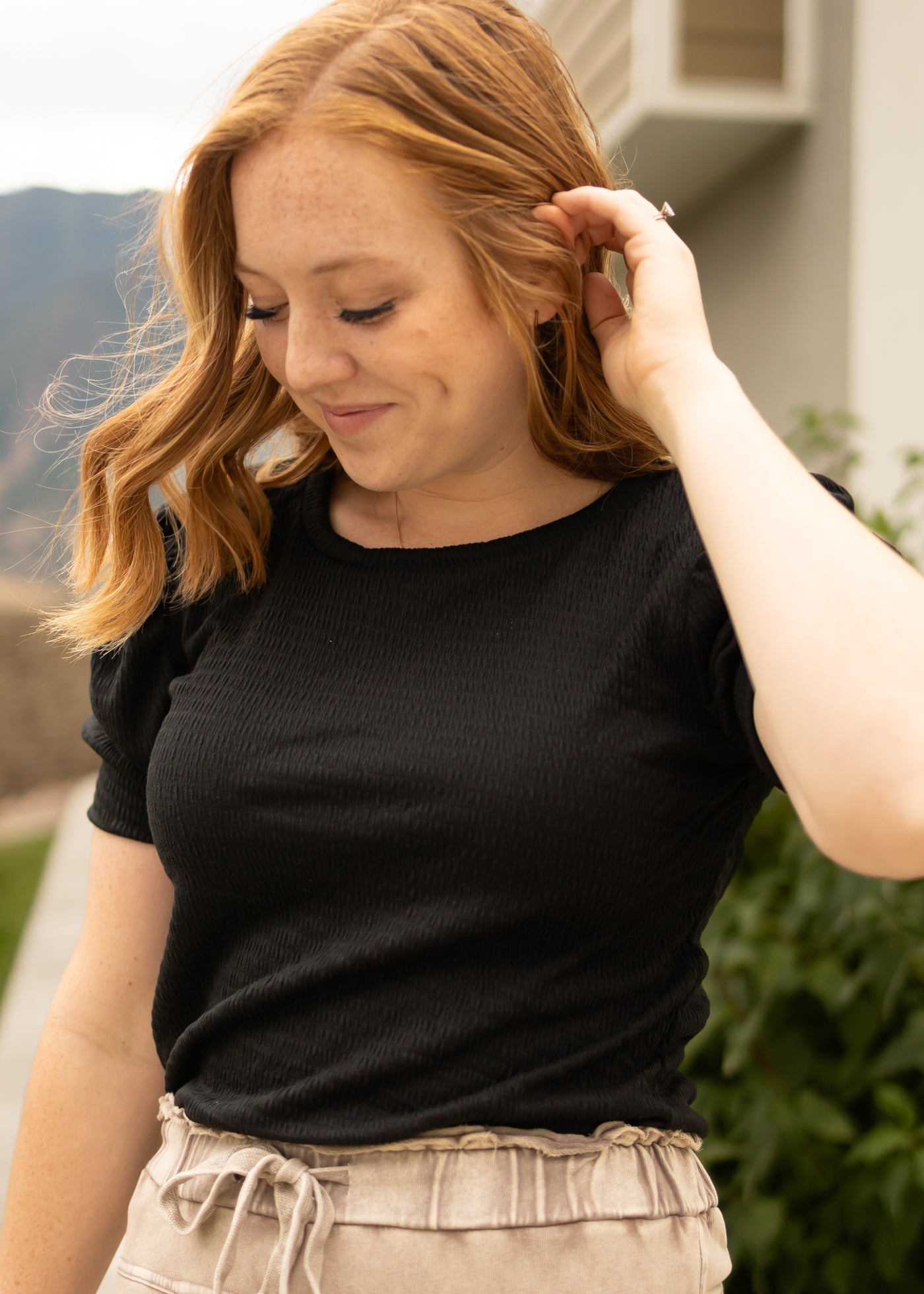 Short sleeve black top with round neck