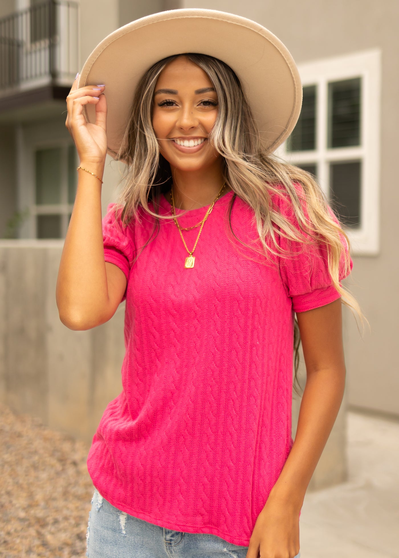 Hot pink top with short puff sleeves