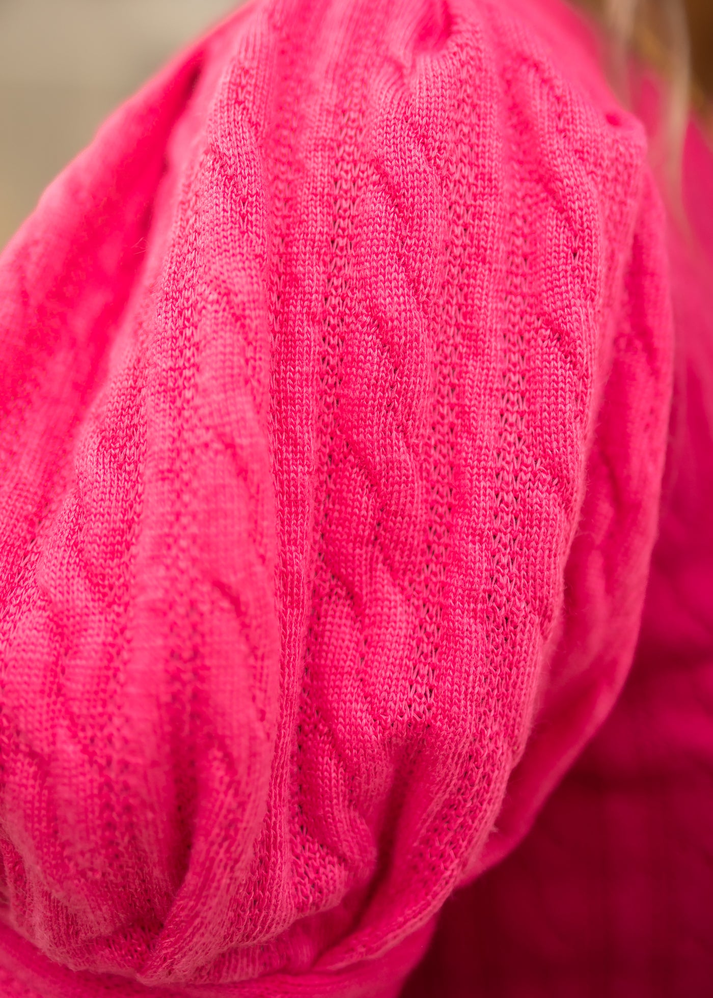 Sweater knit pattern of a hot pink top