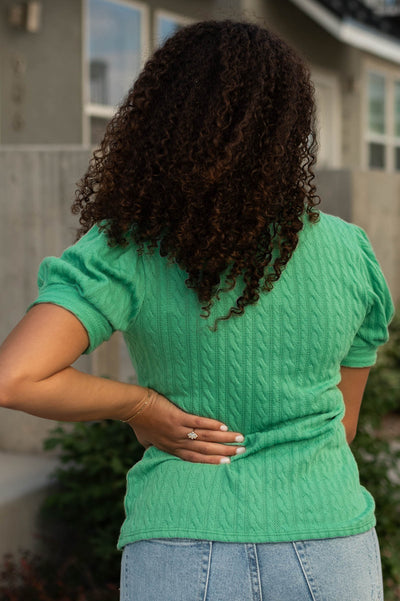 Back view of a kelly green top