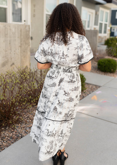 Back view of the black print tiered dress