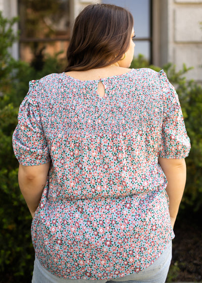 Plus size short sleeve blue top with smocking at the neck