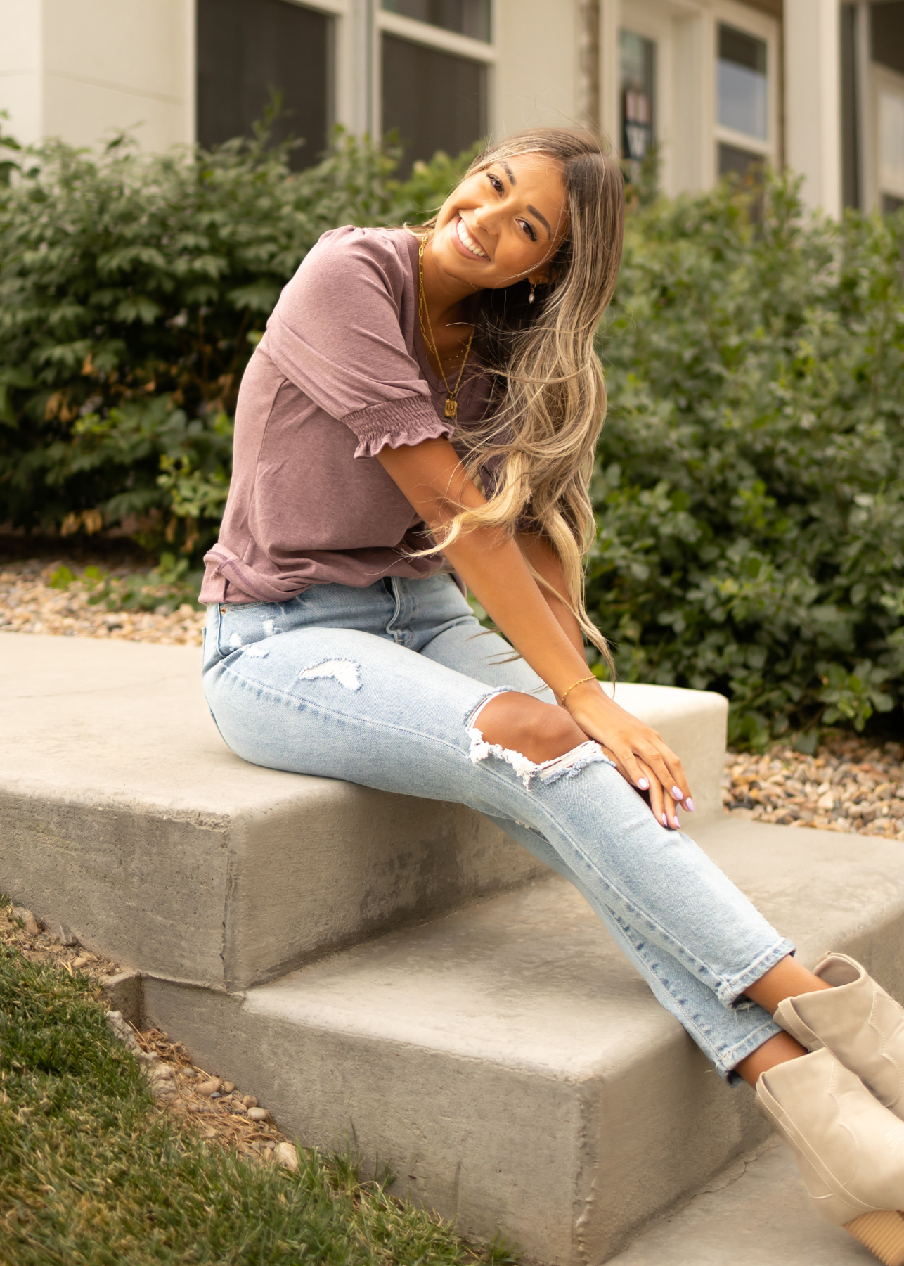 Plum top with short sleeve elastic cuffs