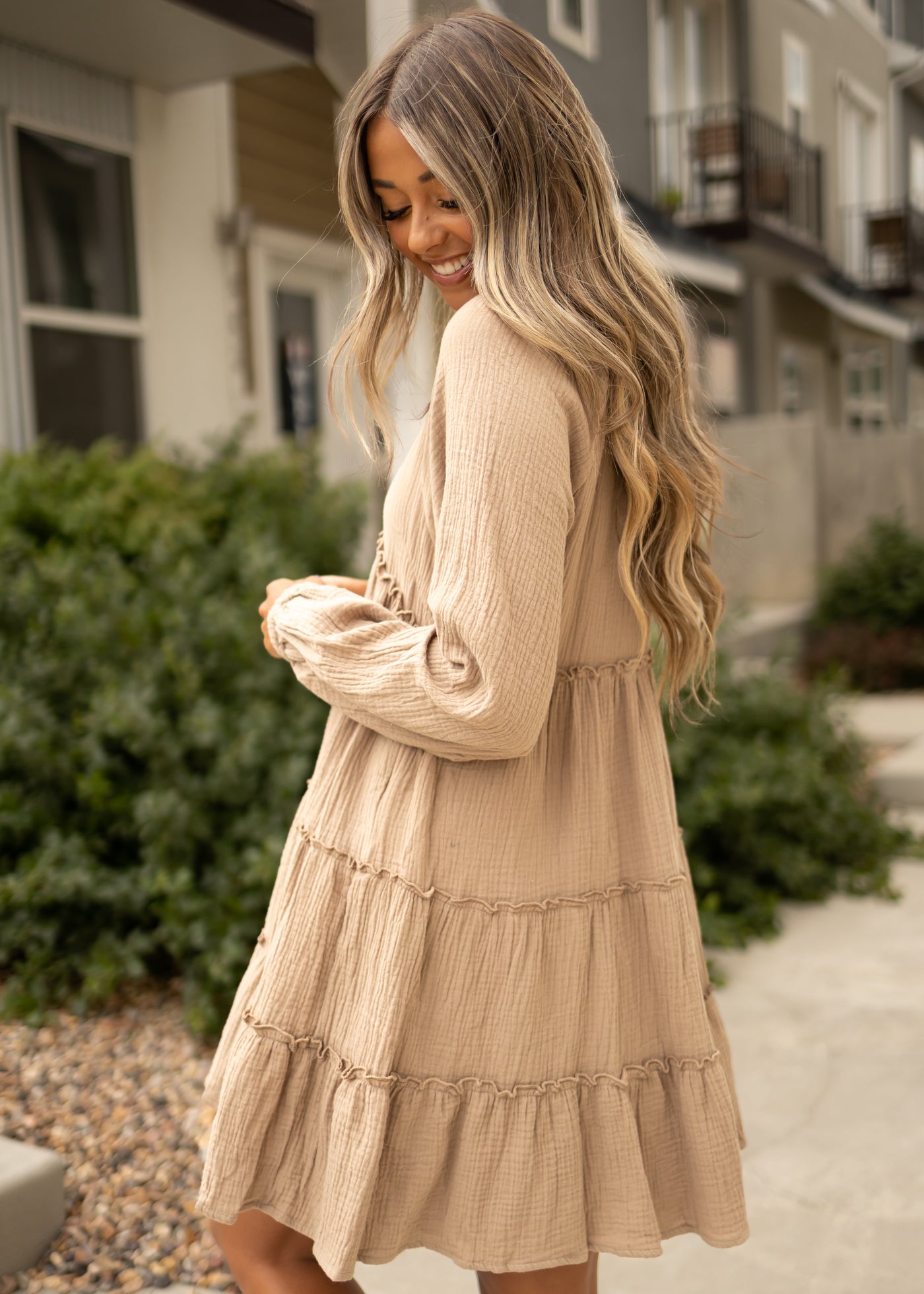 Side view of a taupe dress