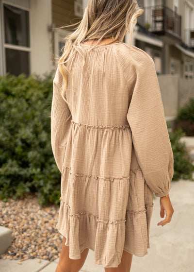 Back view of a taupe dress