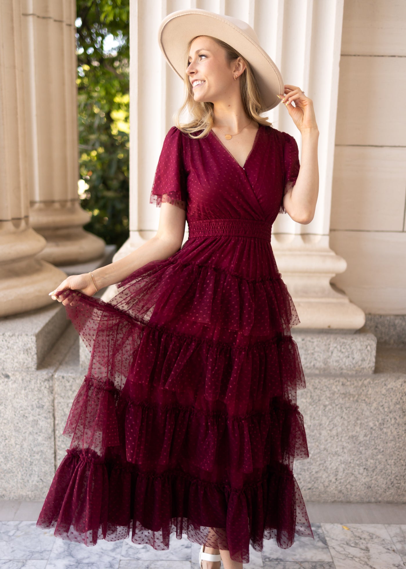 Burgundy dress with a ruffle skirt and short sleeves