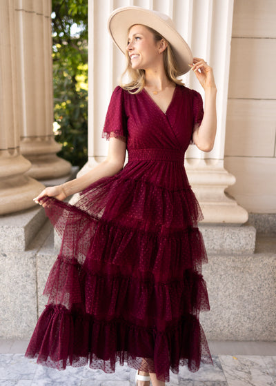 Burgundy dress with a ruffle skirt and short sleeves