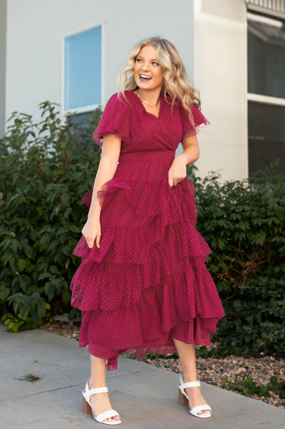 Magenta dress with short sleeves and ruffle skirt