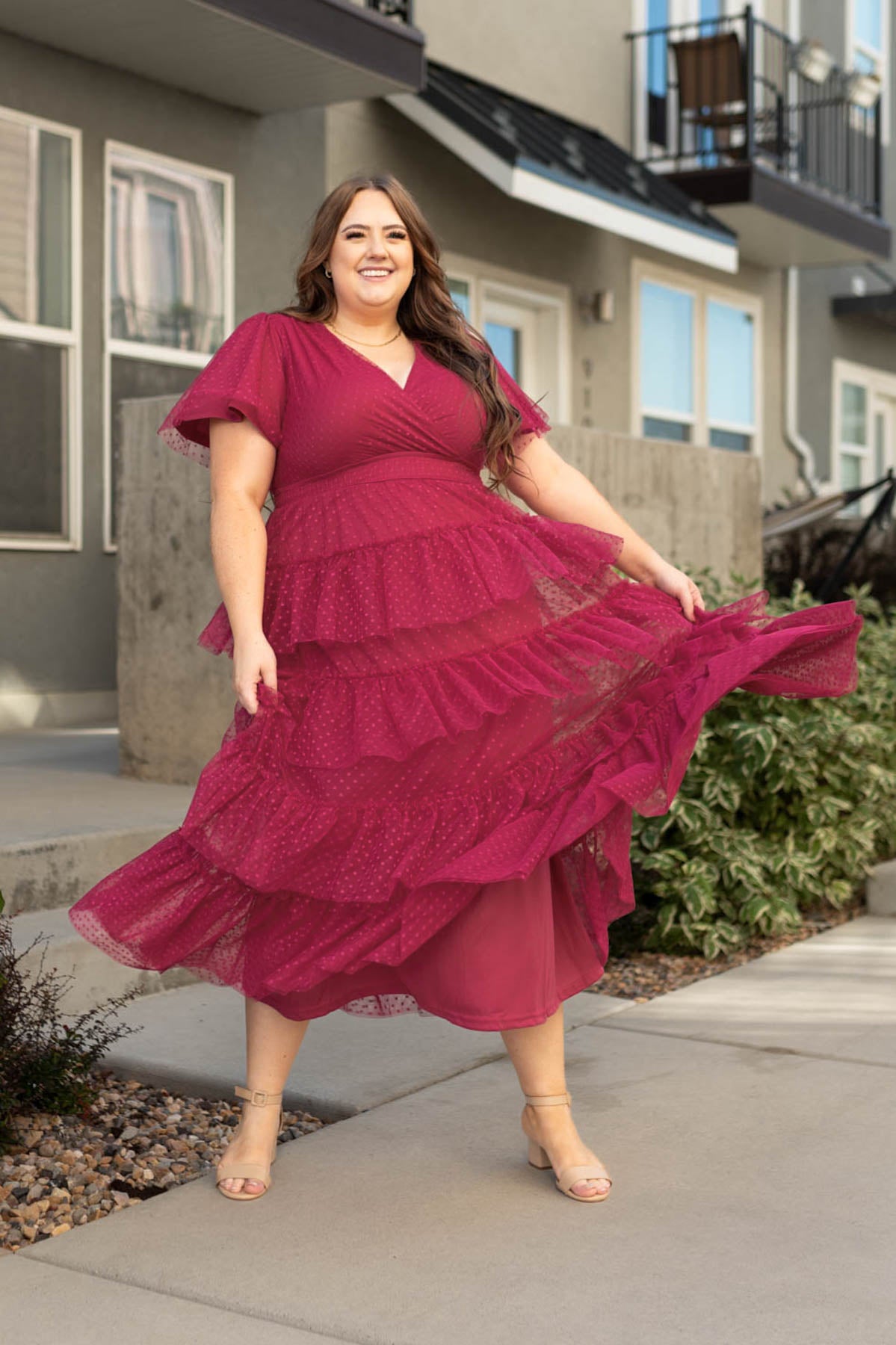Plus size magenta dress with short sleeves and a v-neck