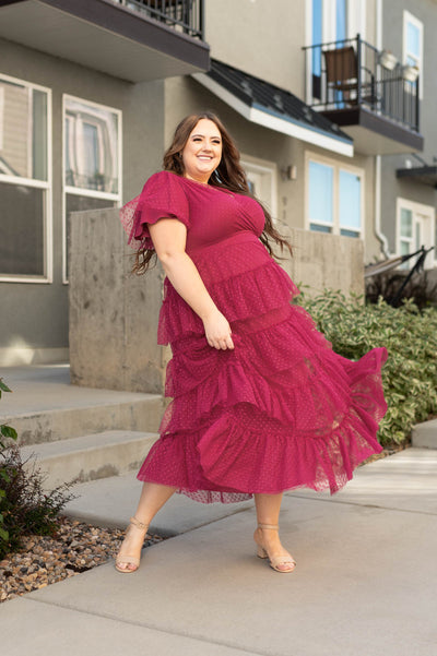 Short sleeve of a plus size magenta dress