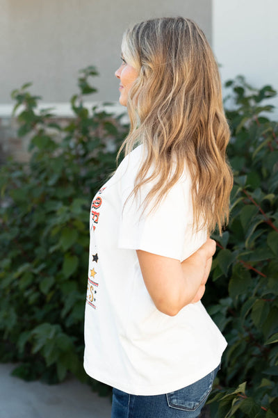 Side view of the stay wild and free ivory tee