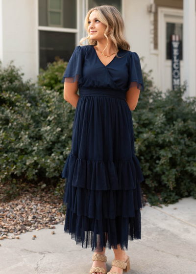 Navy tiered dress with wrap style bodice