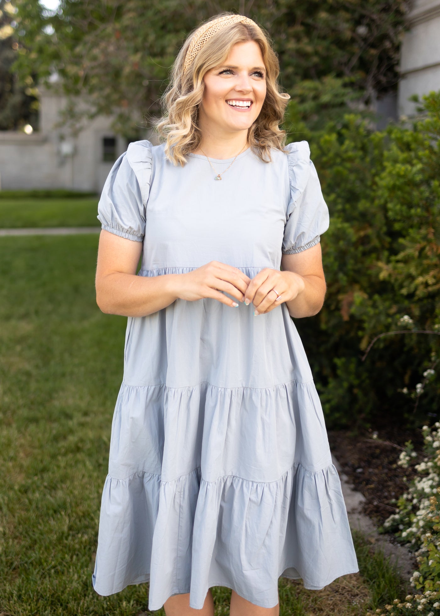 Short sleeve stone blue dress with ruffle at the sleeve