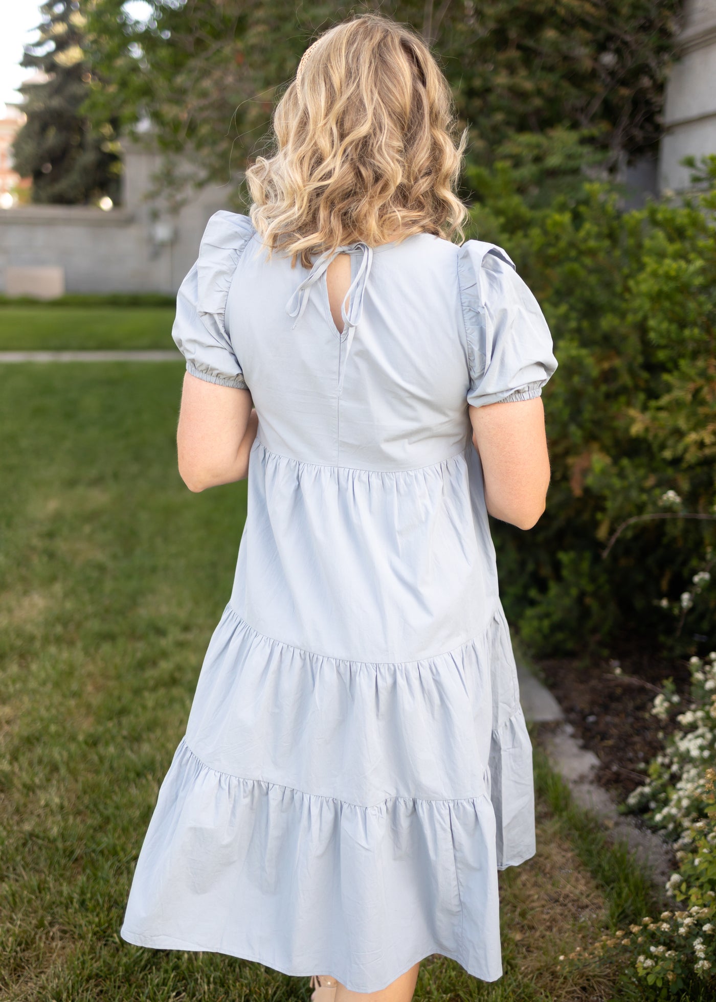 Back view of a stone blue dress