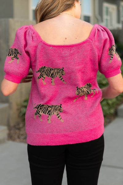 Back view of fuchsia top with tigers