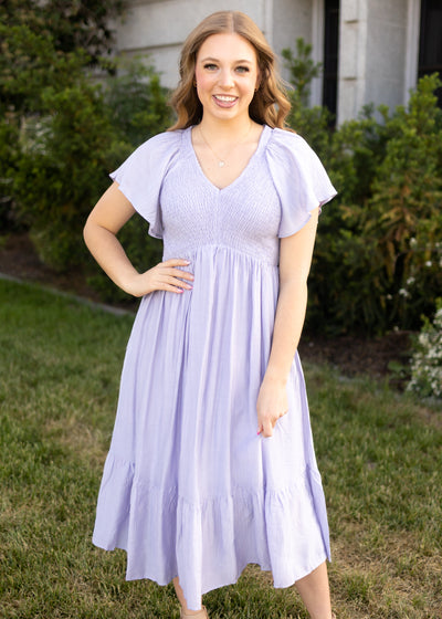 Short sleeve lavender dress with smocked bodice