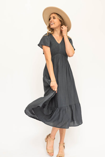 Short sleeve vintage blue dress with smocked bodice.