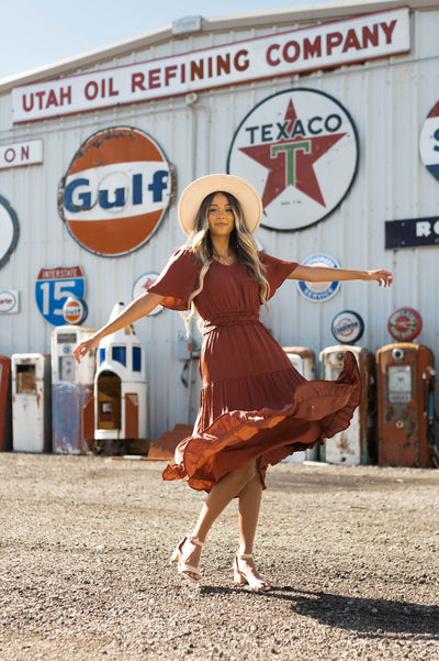 Satin brick colored dress with ruffle at waist