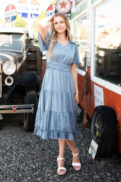 Short sleeve dusty blue dress with tiered skirt