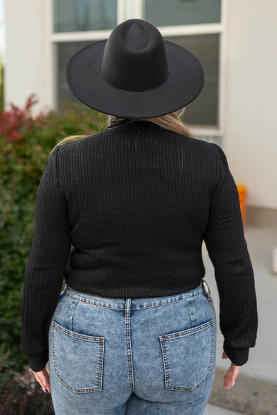 Back view of a plus size black top