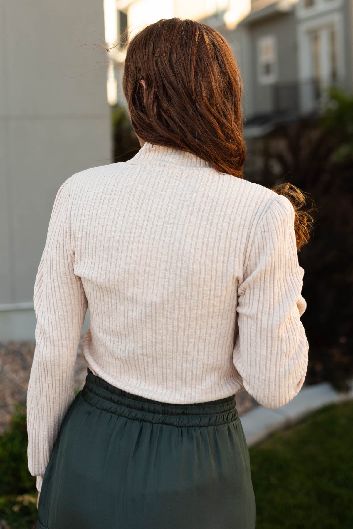 Back view of a cream top