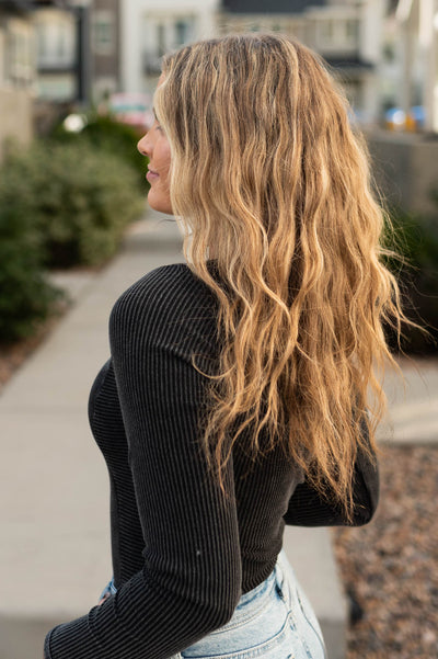 Side view of a black bodysuit