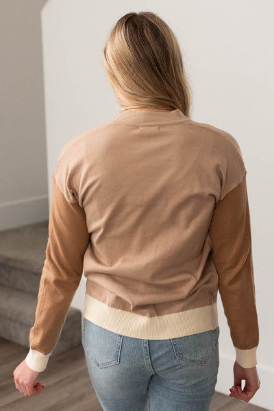 Back view of a taupe cardigan