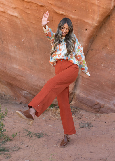 Floral sweater with rust corduroy pants that are sold separately 