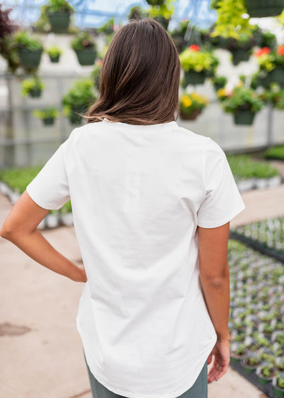 Back view of the classic white v-neck top