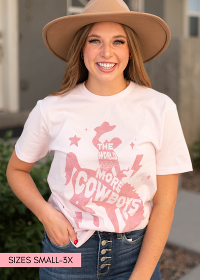 The world needs more cowboys pink tee